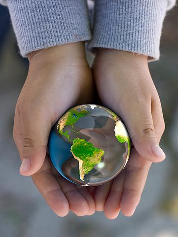 Globe in child\'s hands