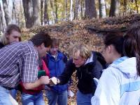 Cam Davidson and some of the Intro Geo class examine a chunk of Platteville Limestone