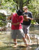 Students measuring stream discharge